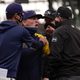 Bench coach Pat Murphy of the Milwaukee Brewers argues a call with umpire Marty Foster during the fourth inning of a game against the Miami Marlins.